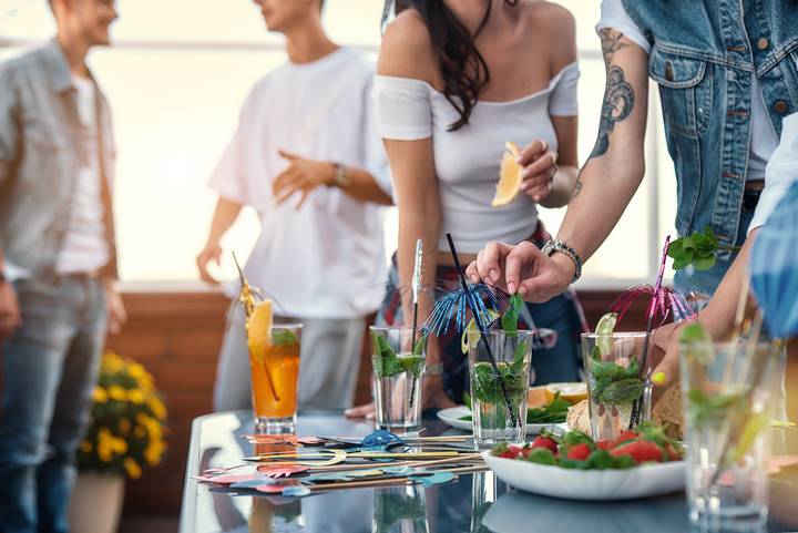A bar and drinks station is one of the best ideas for an outdoor kitchen balcony.