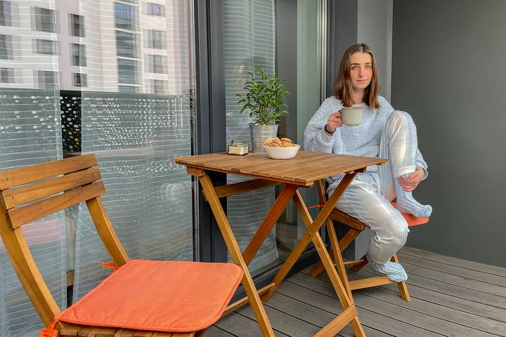 Dining room furniture is one of the best kitchen balcony ideas.