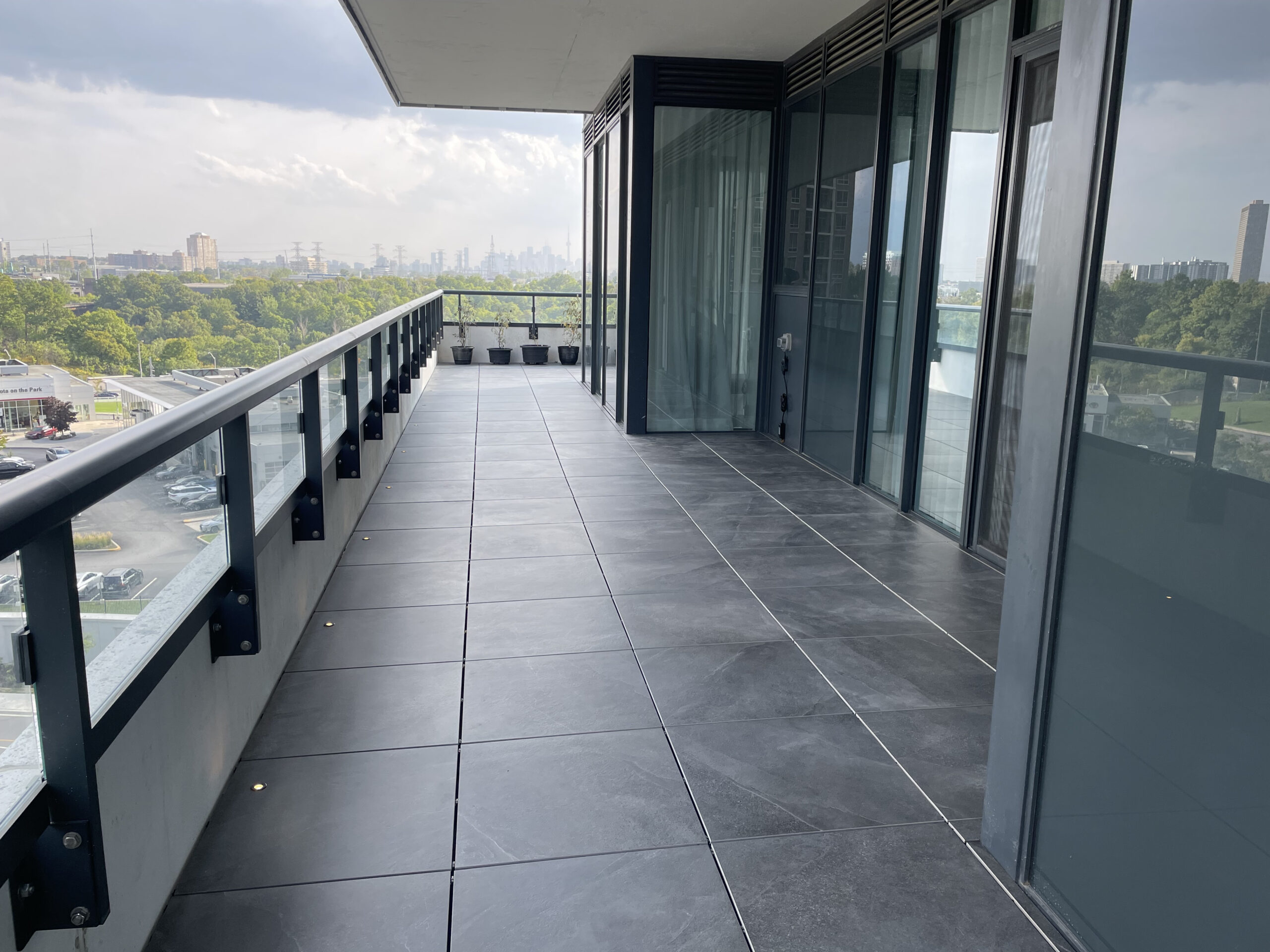 Featured: Porsets - Elevated Porcelain Tiles Color: Magma Tile Size: 2'x2' Custom: LED in tile pot lights installed