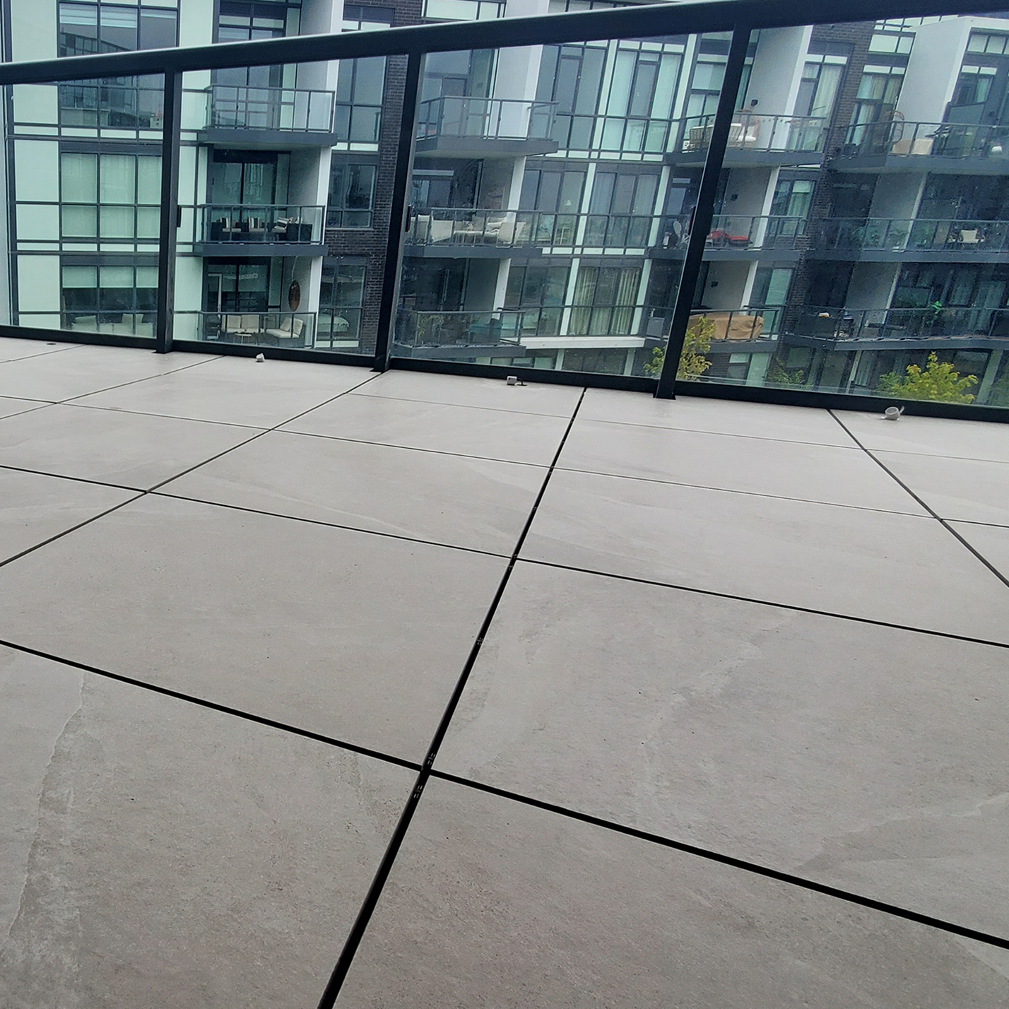 Modernize Outdoor Spaces with Porcelain Tiles | Designer Deck