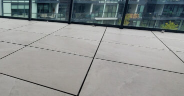 designer-deck-canadian-winters-wood-plastic-composite-tile.jpg